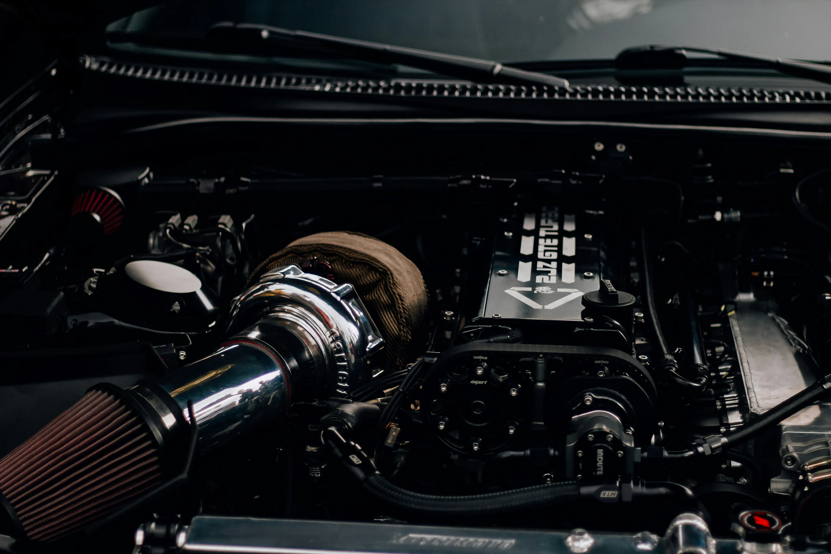 A close up of the engine of a car