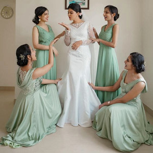 Christian Bride accompanied by Bridesmaids