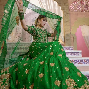 Elegant Parrot Green Wedding Outfit Embellished with Golden Design Elegant Parrot Green Wedding Outfit Embellished with Golden Design