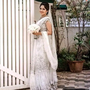 Stunning Christian Bride in White Saree with Veil Stunning Christian Bride in White Saree with Veil
