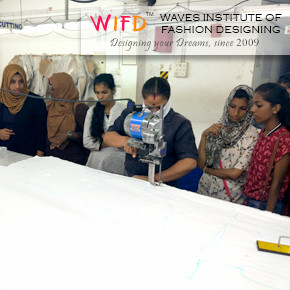 Cutting the Fabric with Electric Machine Cutting the Fabric with Electric Machine