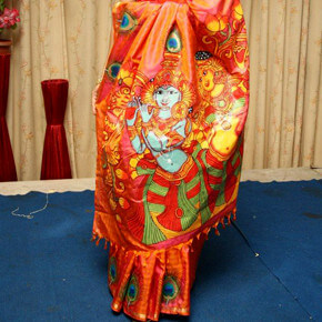 Lord Krishnas Mural Painting on a Red Saree