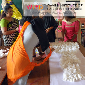 Placing the designed white tissue paper over chart Placing the designed white tissue paper over chart