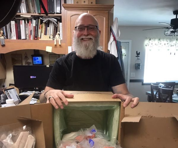 Member Jack C. showing off the fish in his new box