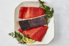 raw alaskan salmon on plate