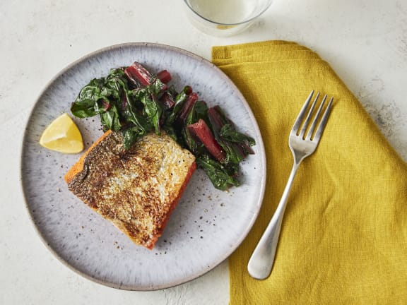 cooked piece of salmon on plate