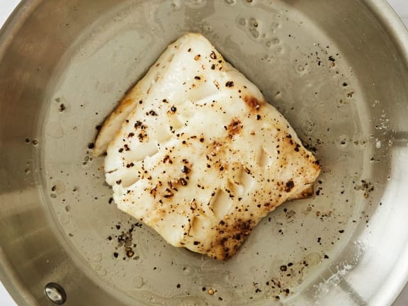 broiled sablefish fillet in skillet