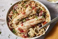 seafood pasta with pacific cod, tomatoes, and olives