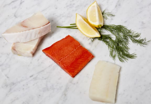 raw halibut, salmon and cod fish