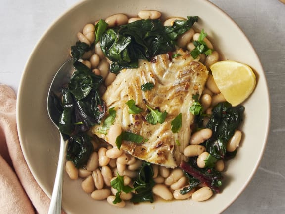 seared pacific cod on beans and greens