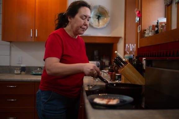 Pictured above: Melanie Brown in her kitchen, preparing some of the treasures from her freezer.