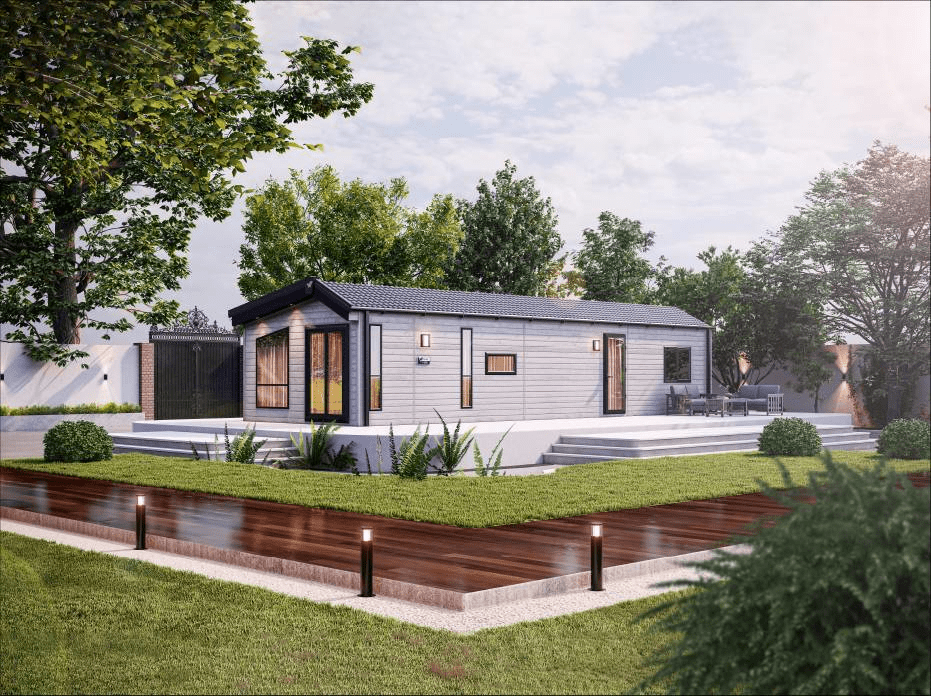 The Willerby Astoria exterior in grey with white decking placed in a beautiful garden.