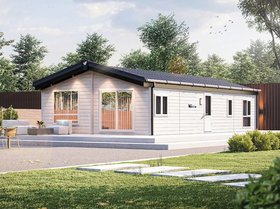 The Willerby Hayward exterior in light grey sited in a peaceful garden.