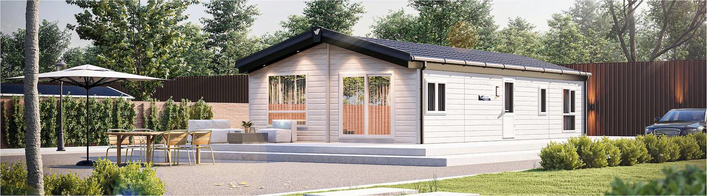 The Willerby Hayward exterior in light grey sited in a peaceful garden.