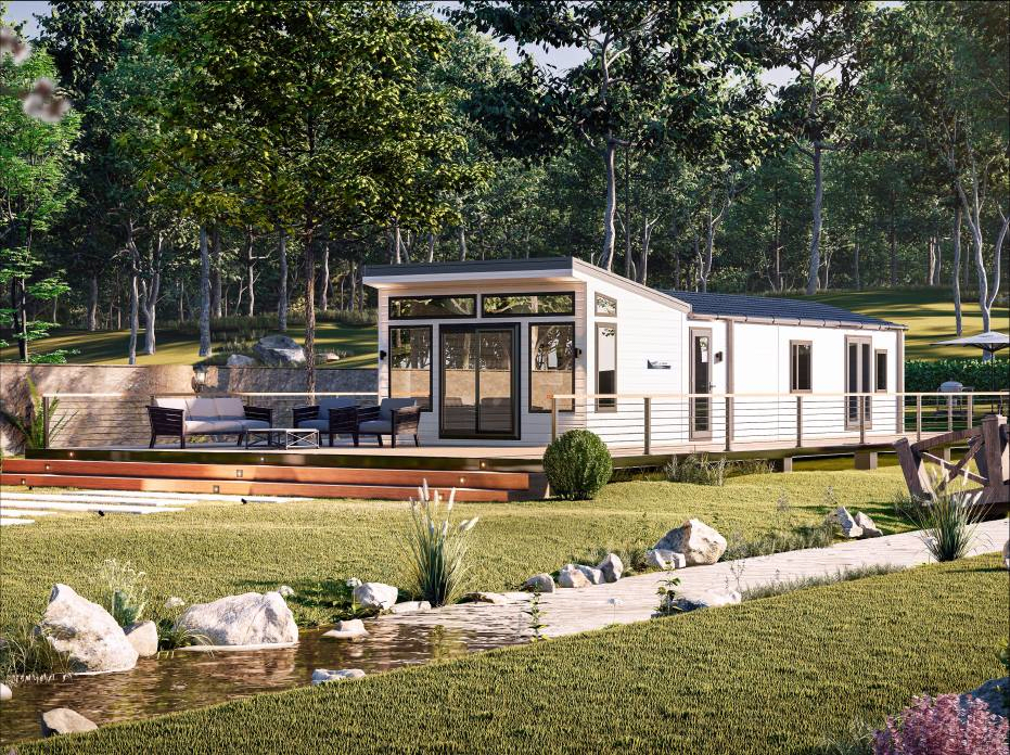 The Willerby Vogue Classique with a white exterior, sited on a secluded grassy field.
