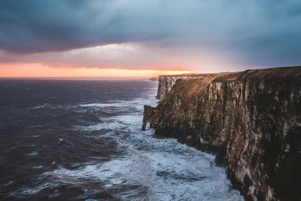 Waves breaking on Bempton Cliffs near Bridlington on the East Riding of Yorkshire Coast