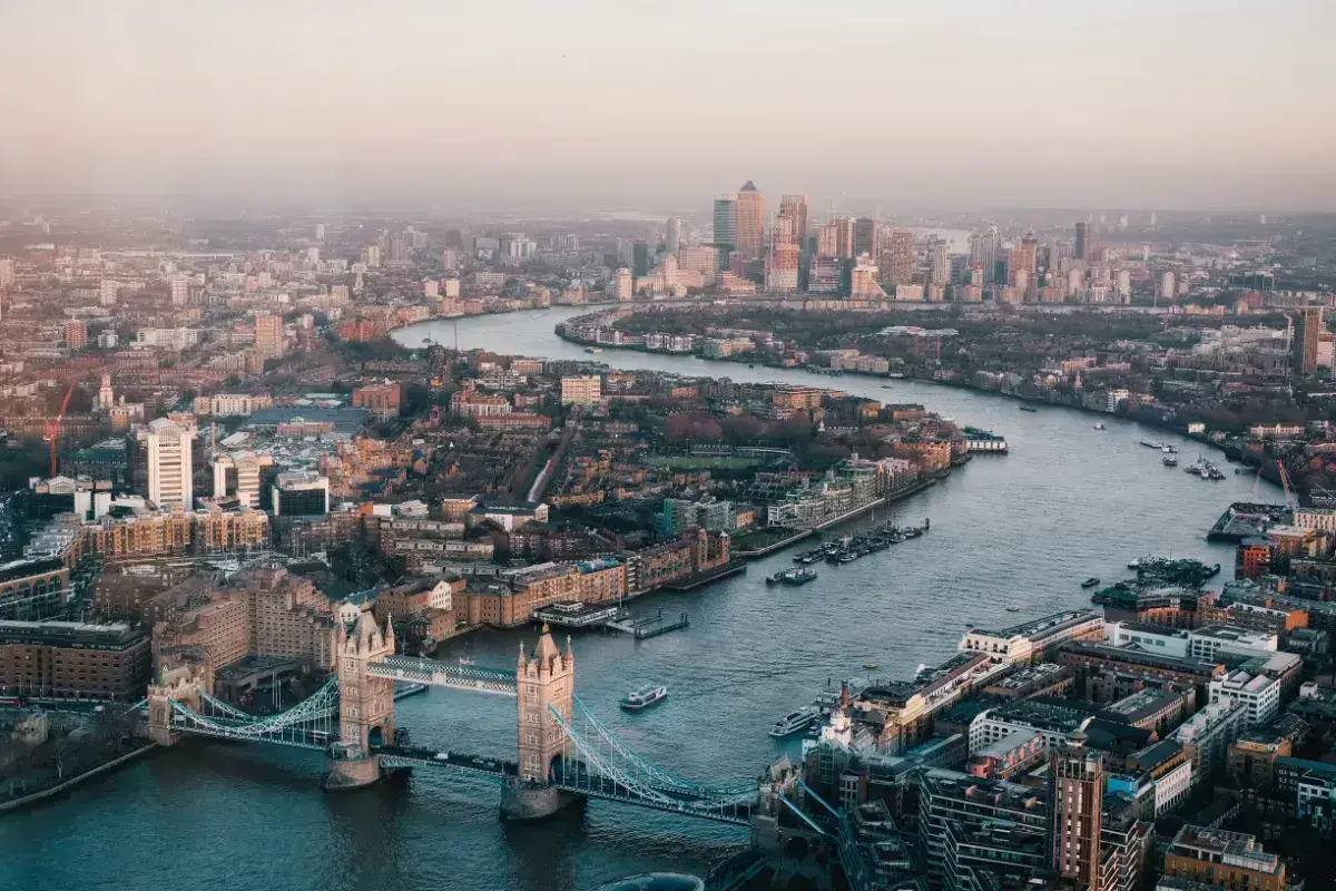 View across London from The Shard, including Tower Bridge, the River Thames and Canary Wharf. 