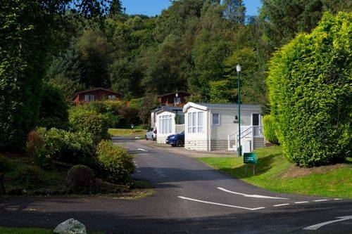 LW Holiday Homes in Gardens.jpg