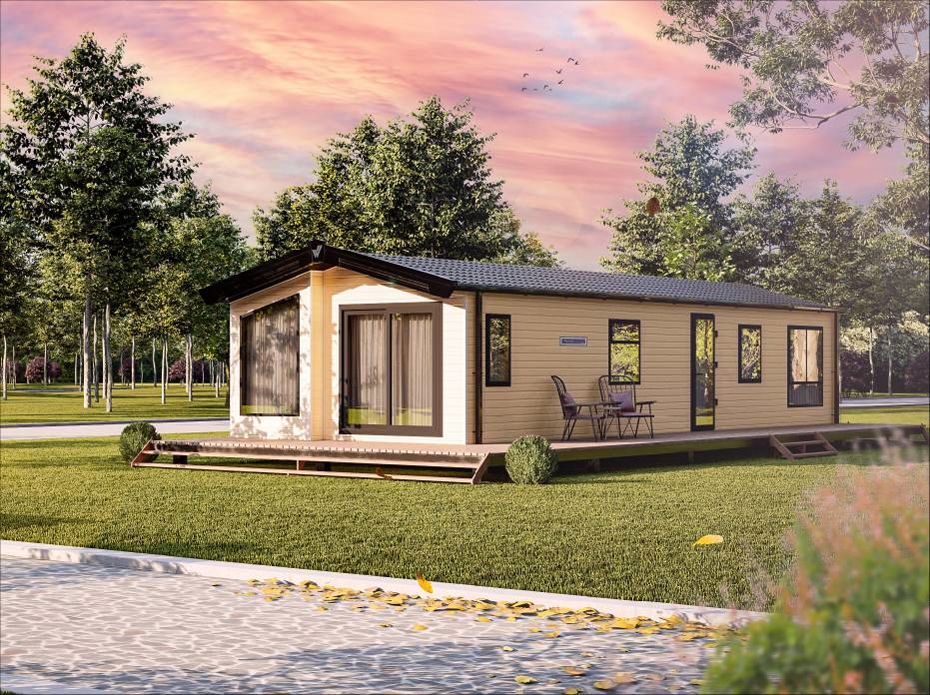 The Willerby Waverley exterior in a light yellow sited on a grassy field.