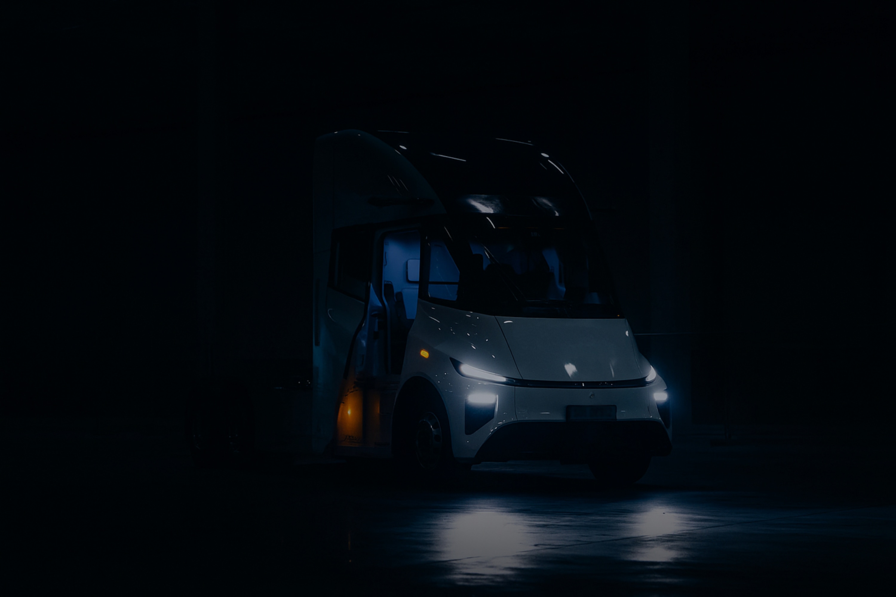 Windrose truck in dark industrial setting