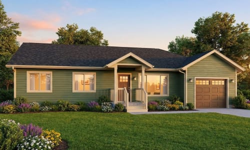 Green cottage-style modular home by Wisconsin Homes featuring a covered front porch, single-car garage with wood-look door, and lush flower landscaping, all bathed in the glow of a sunset sky.