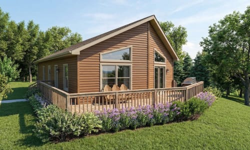 Log siding cottage-style modular home by Wisconsin Homes in Marshfield, WI with full wraparound deck and forest setting.