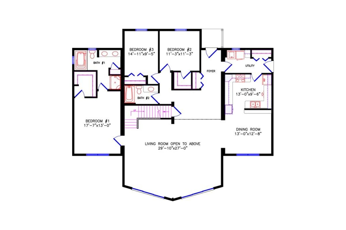 Rustic A-frame chalet with wood siding, triangular front windows, a front deck with railings, and surrounding landscaping with shrubs and flowers.