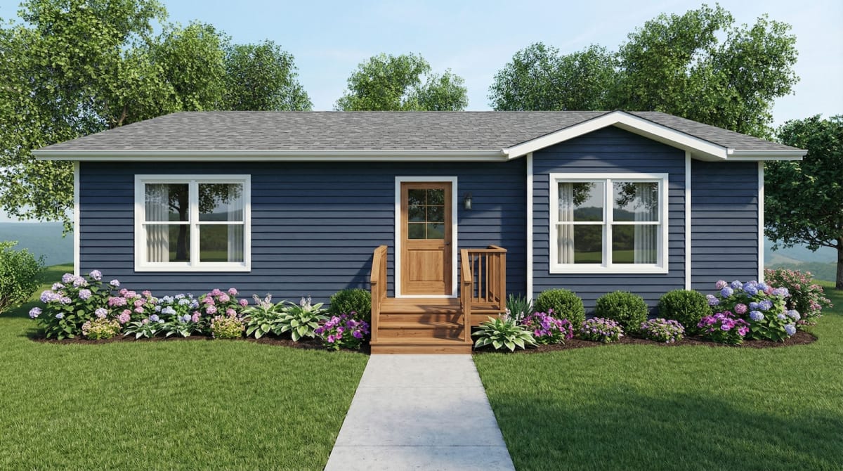 Small blue modular home with wooden front steps and colorful flower landscaping by Wisconsin Homes in Marshfield, WI.