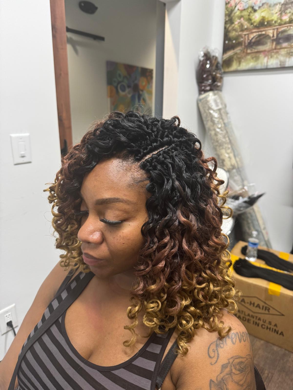 Woman with beautiful and neat crochet braids in Georgia
