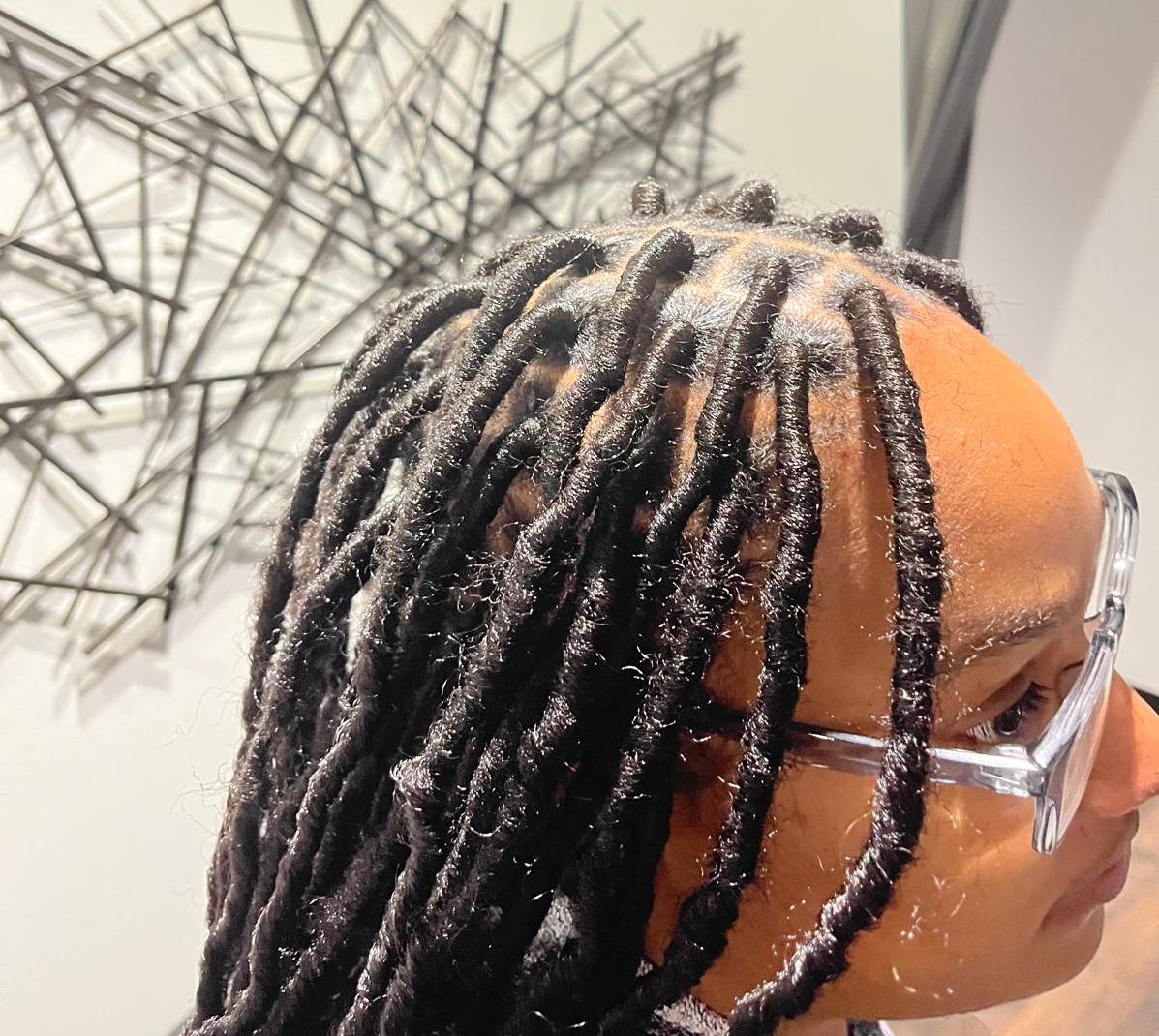 Woman with neat dreadlocks in Sandy Springs