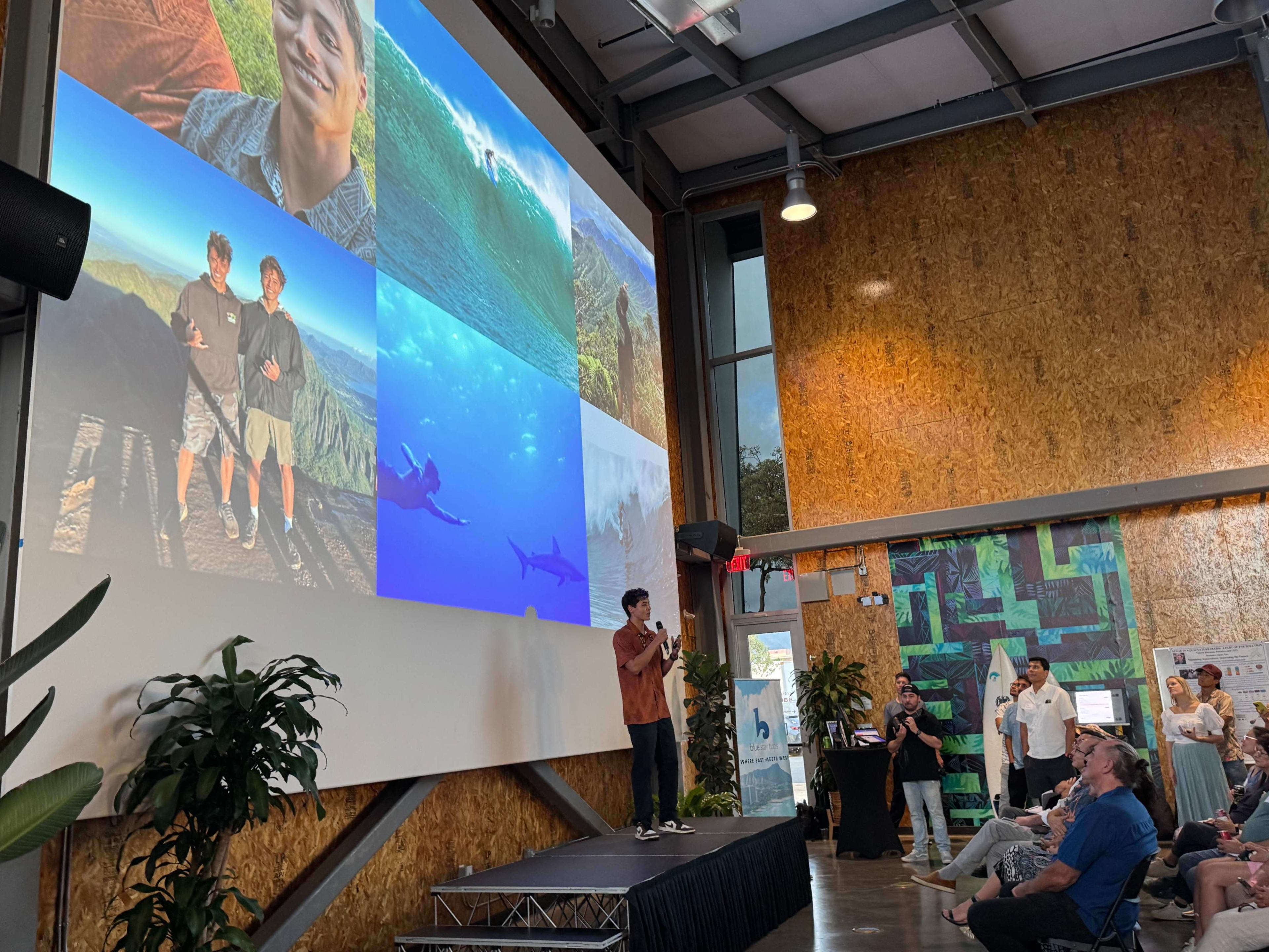 Koa presenting Mission Mālama on stage at Honolulu Demo Day