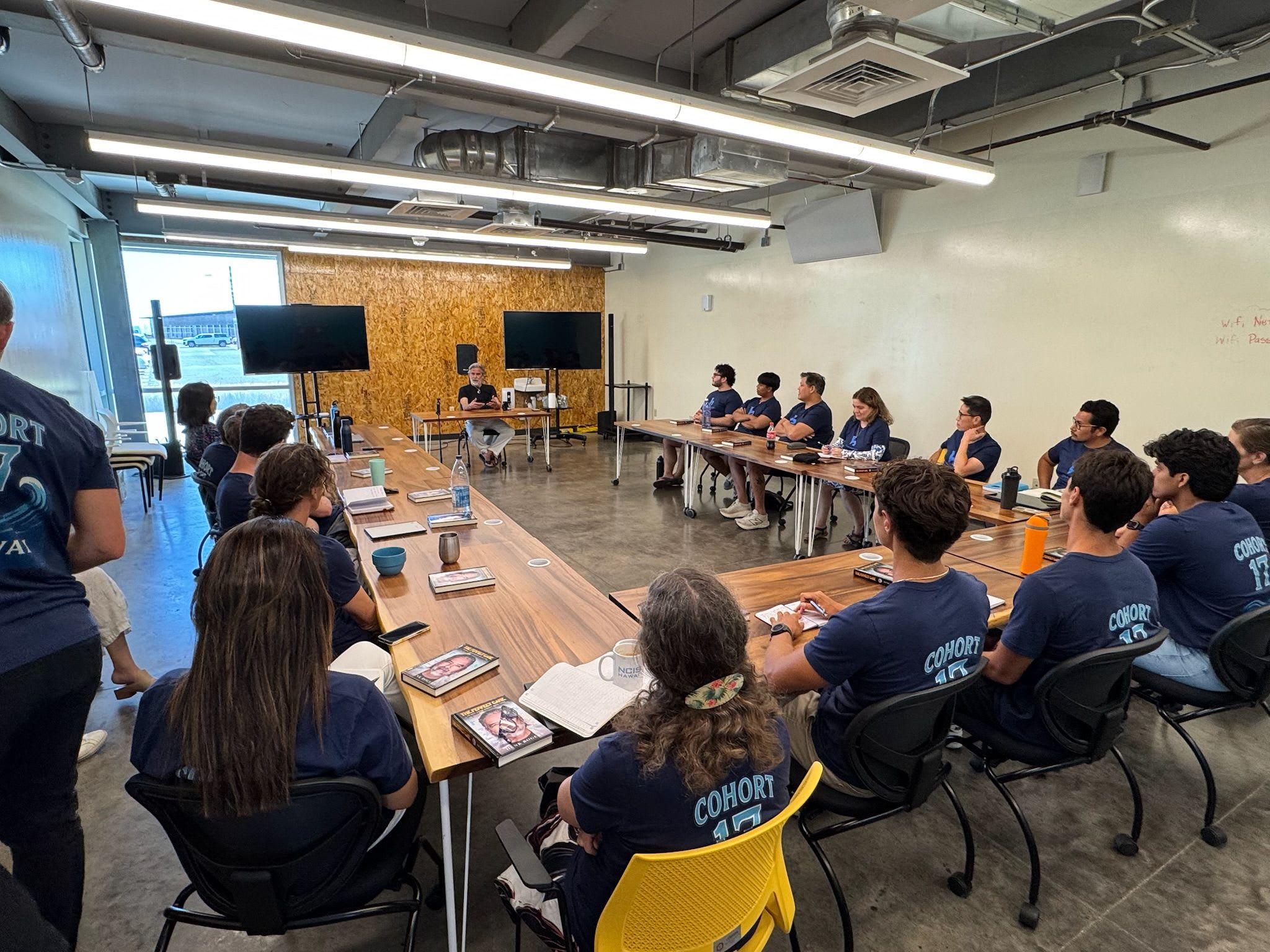 Cohort 17 seated together in a workshop session