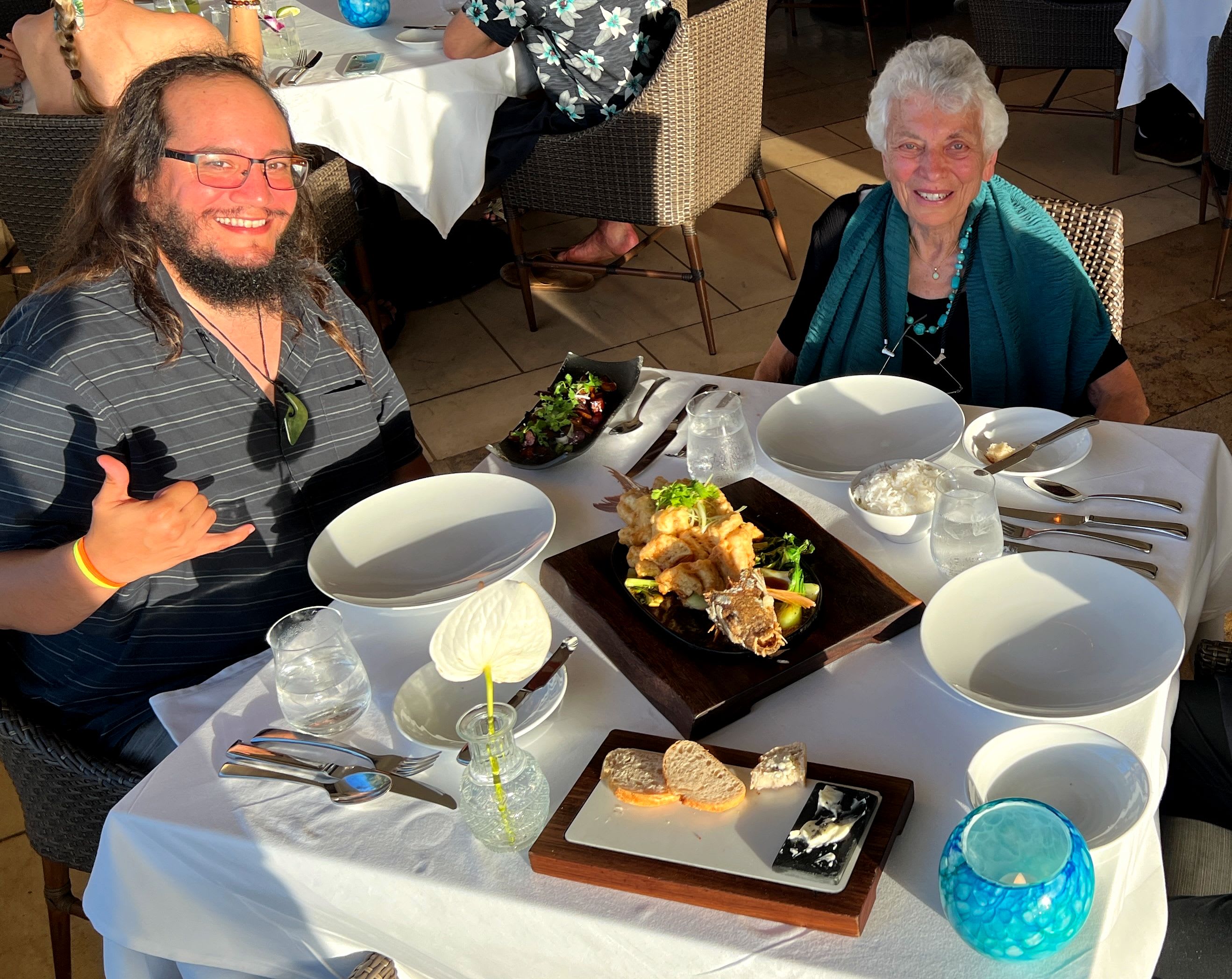 Vinnie with his grandmother at sunset by the ocean
