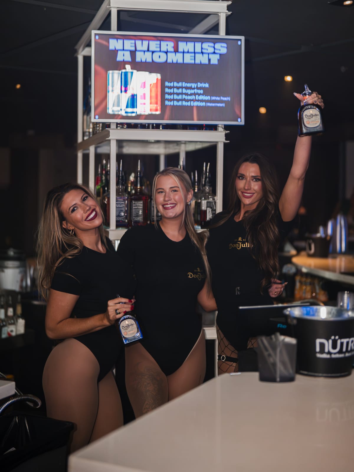 Brand team behind the bar at The District
