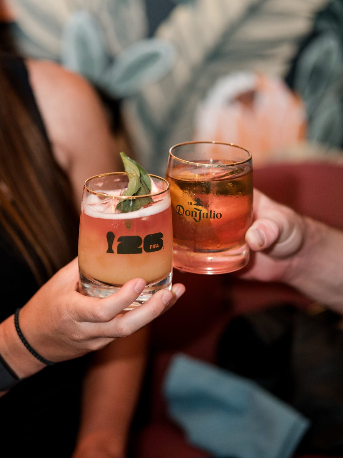 Two Don Julio cocktails clinked together