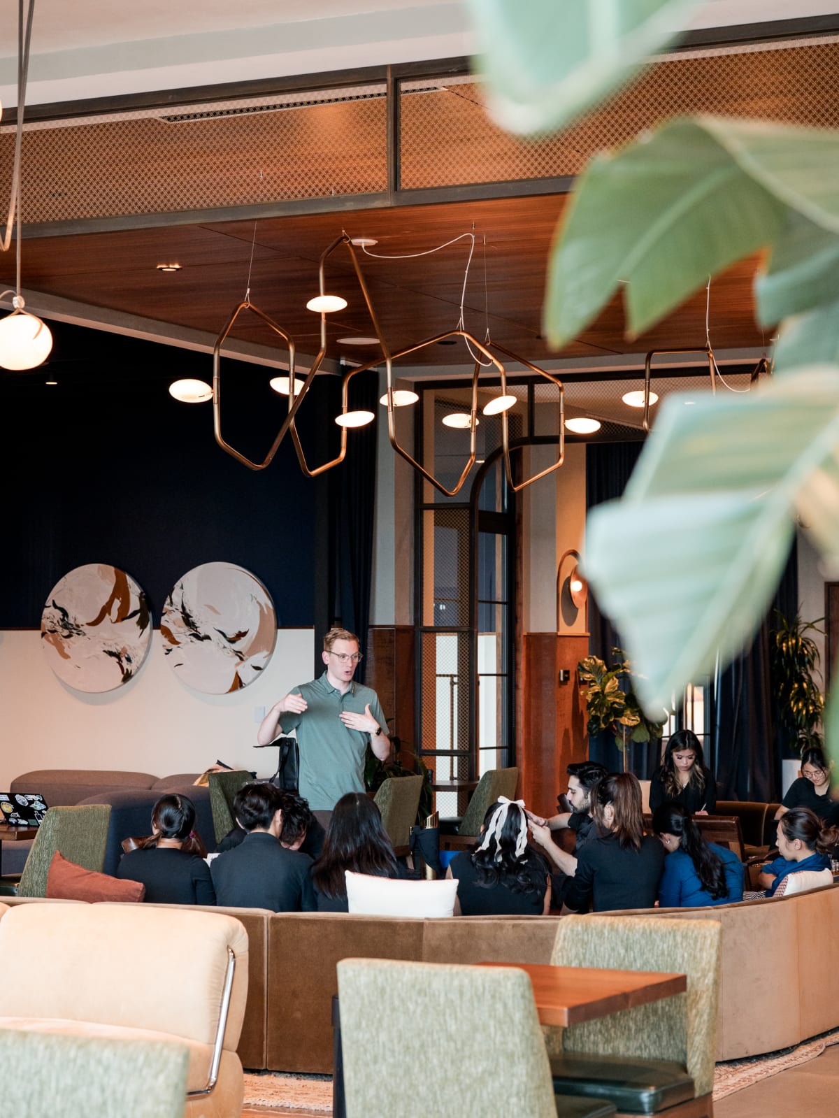 Host leading the tasting for seated guests