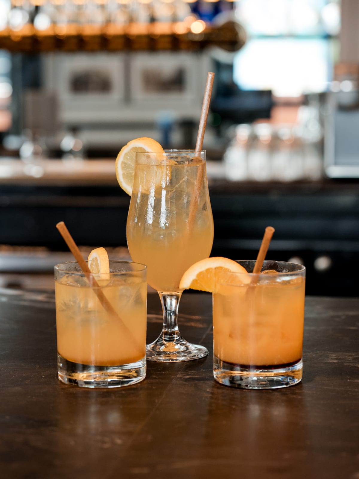 Three citrus Oban highballs finished on the bar top