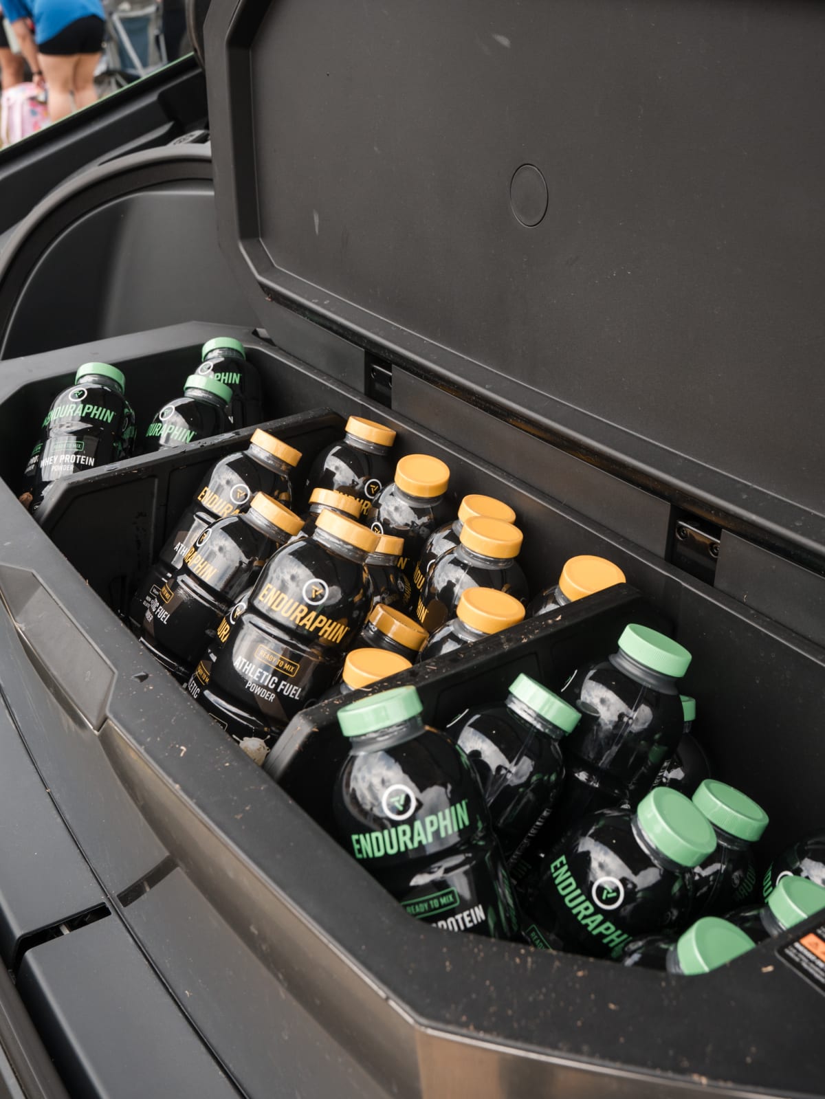 Cold Enduraphin bottles packed in ice in the truck bed cooler