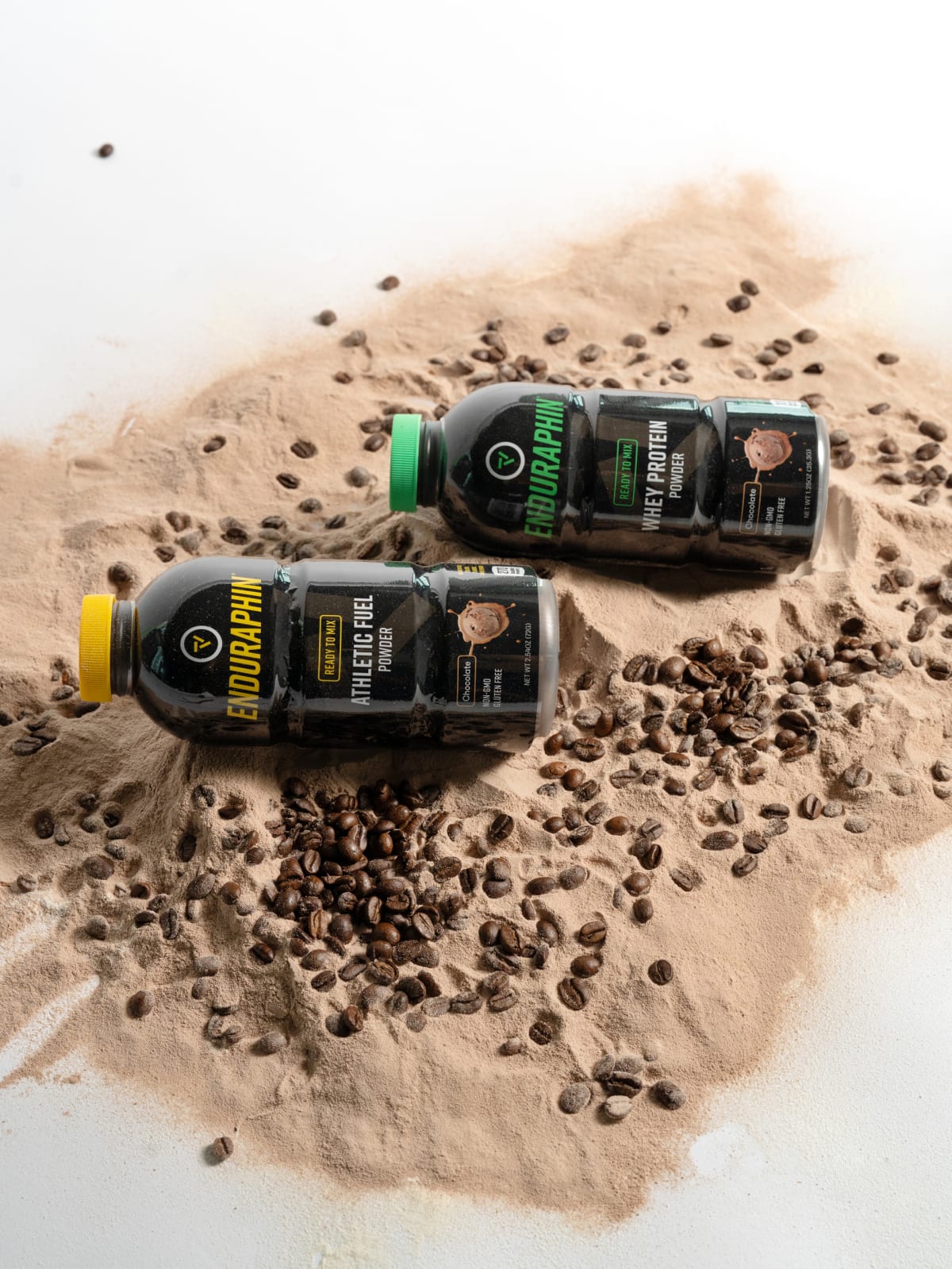 Recovery powder spilled across a linen backdrop with two packs