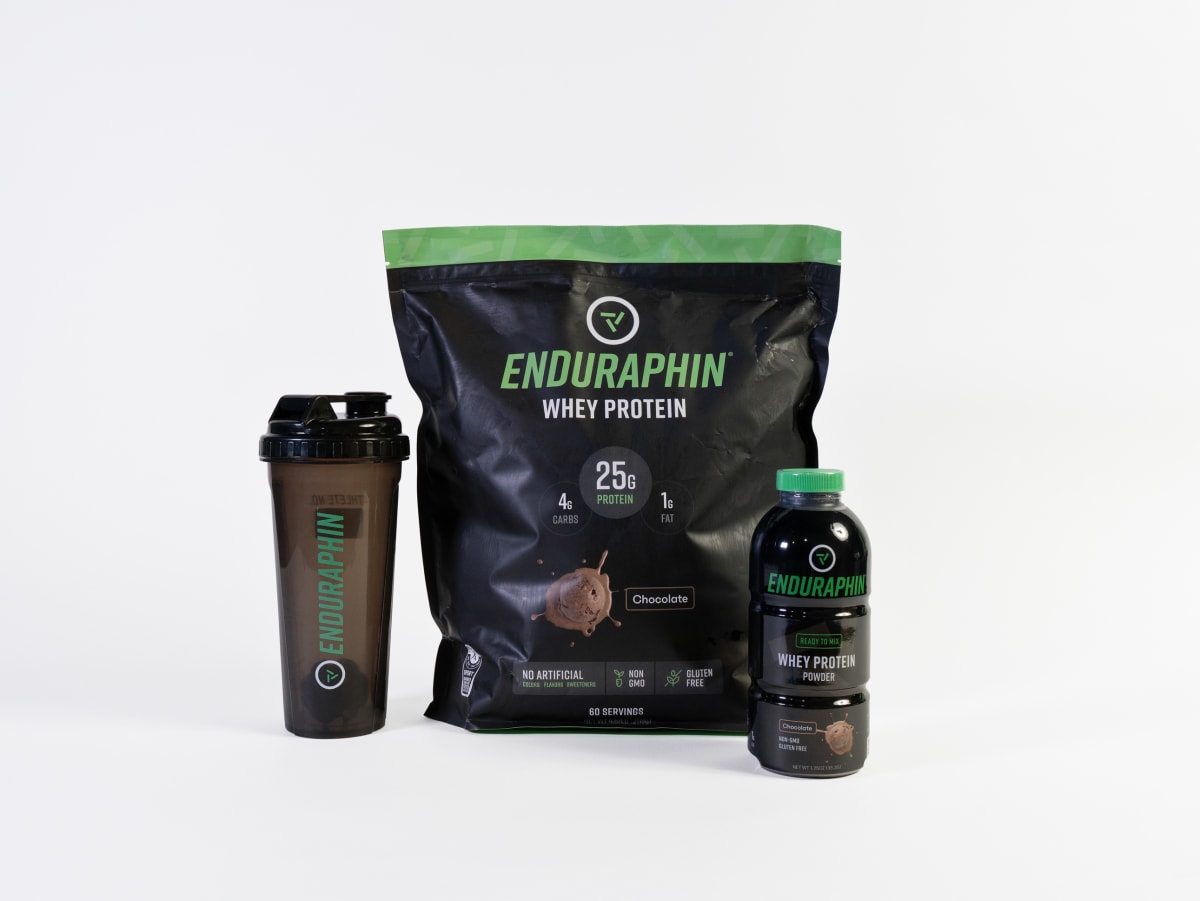 Enduraphin pack, shaker, and bottle staged together on white