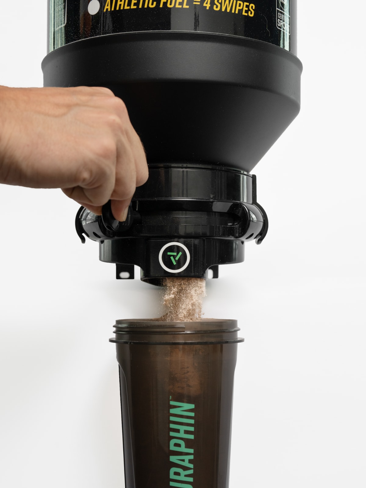 Close crop of a single scoop leaving the dispenser