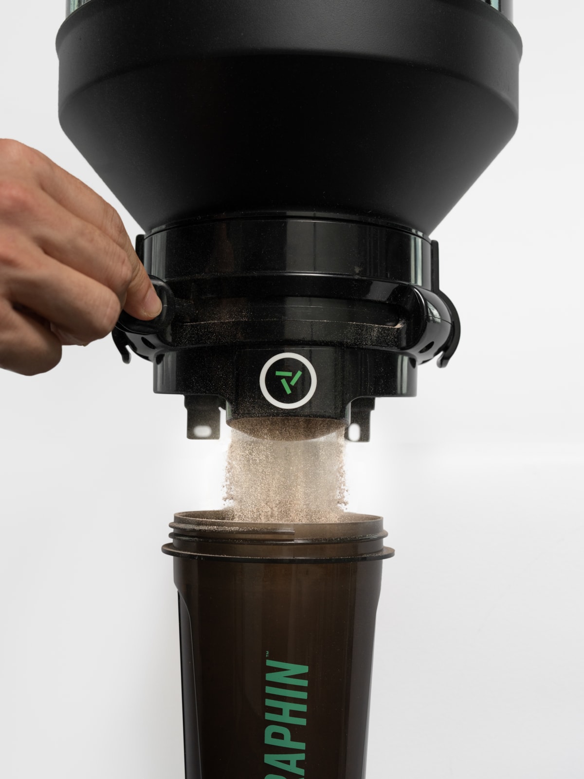 Recovery powder dispensing into a shaker cup