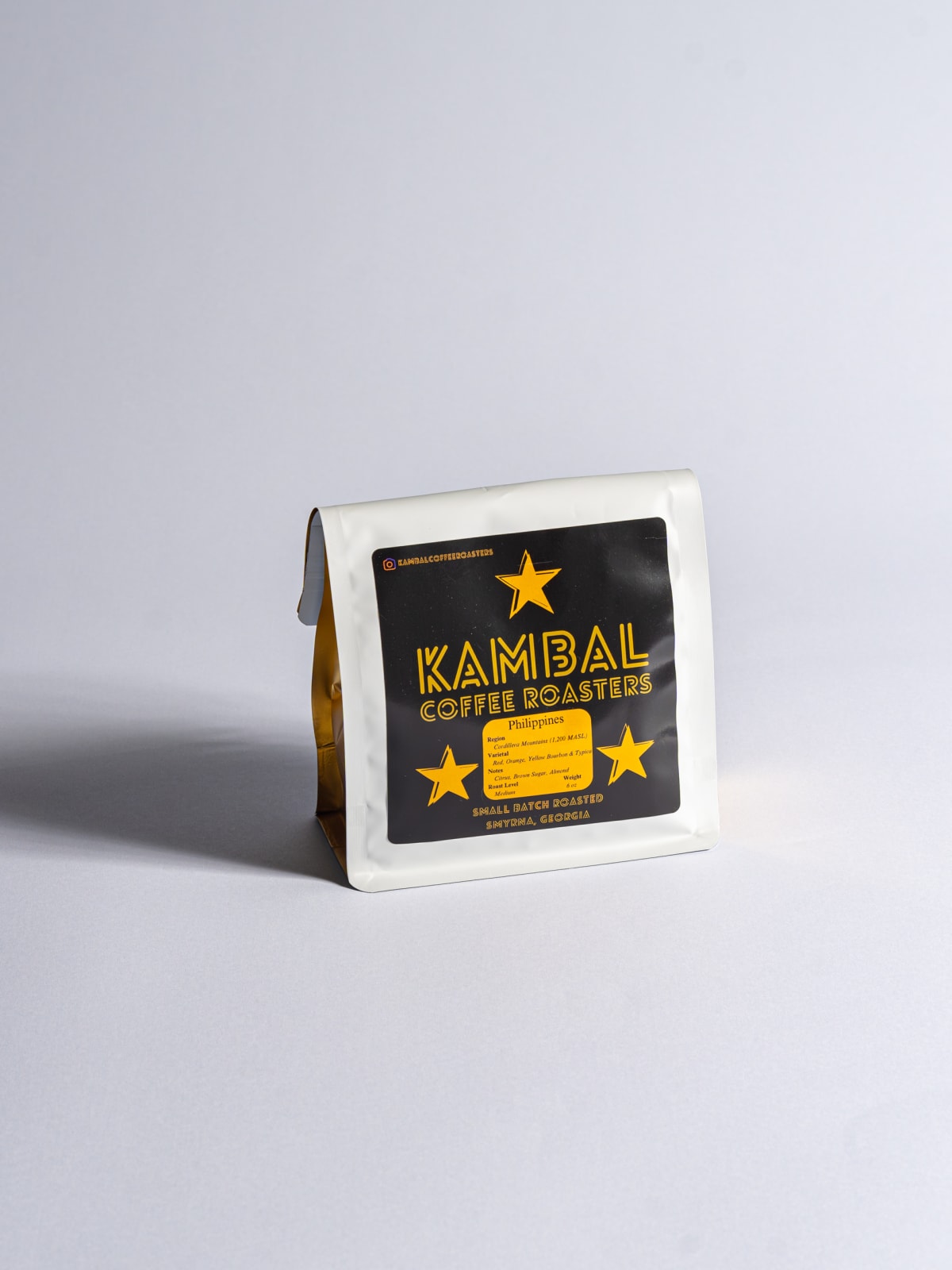 Kambal Coffee Roasters bag standing on white seamless