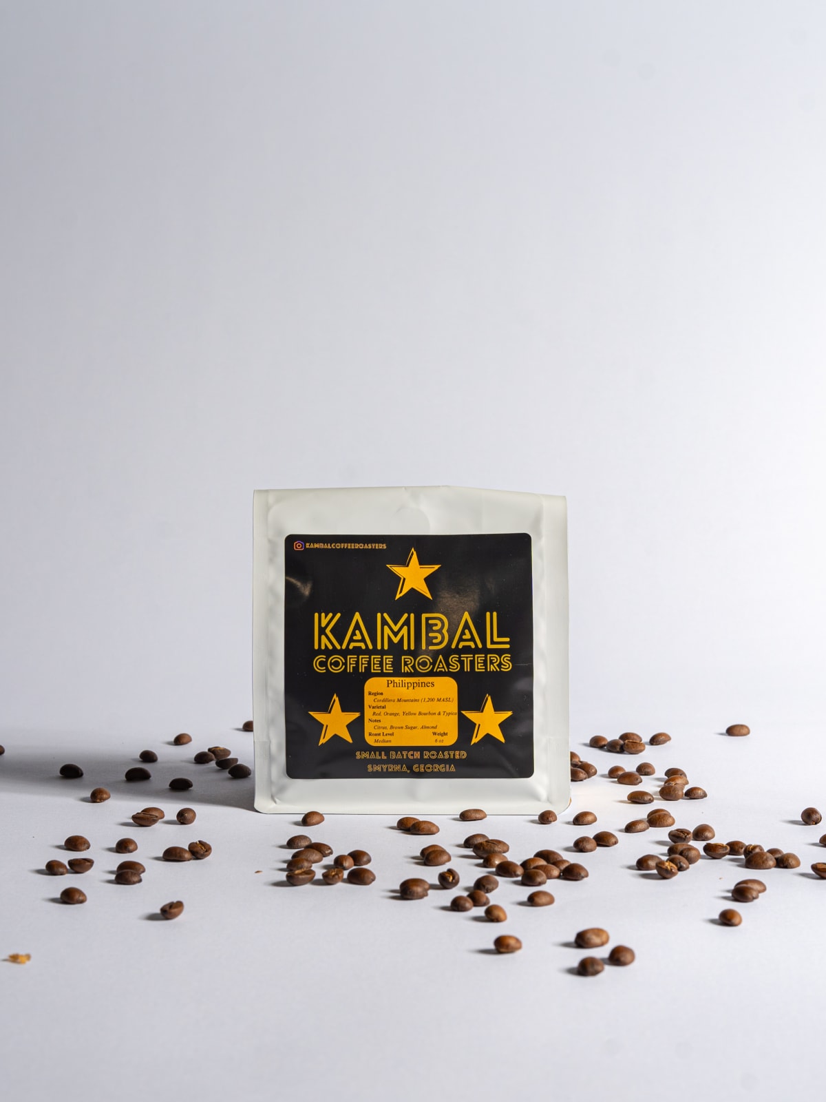 Kambal bag with beans scattered across the sweep
