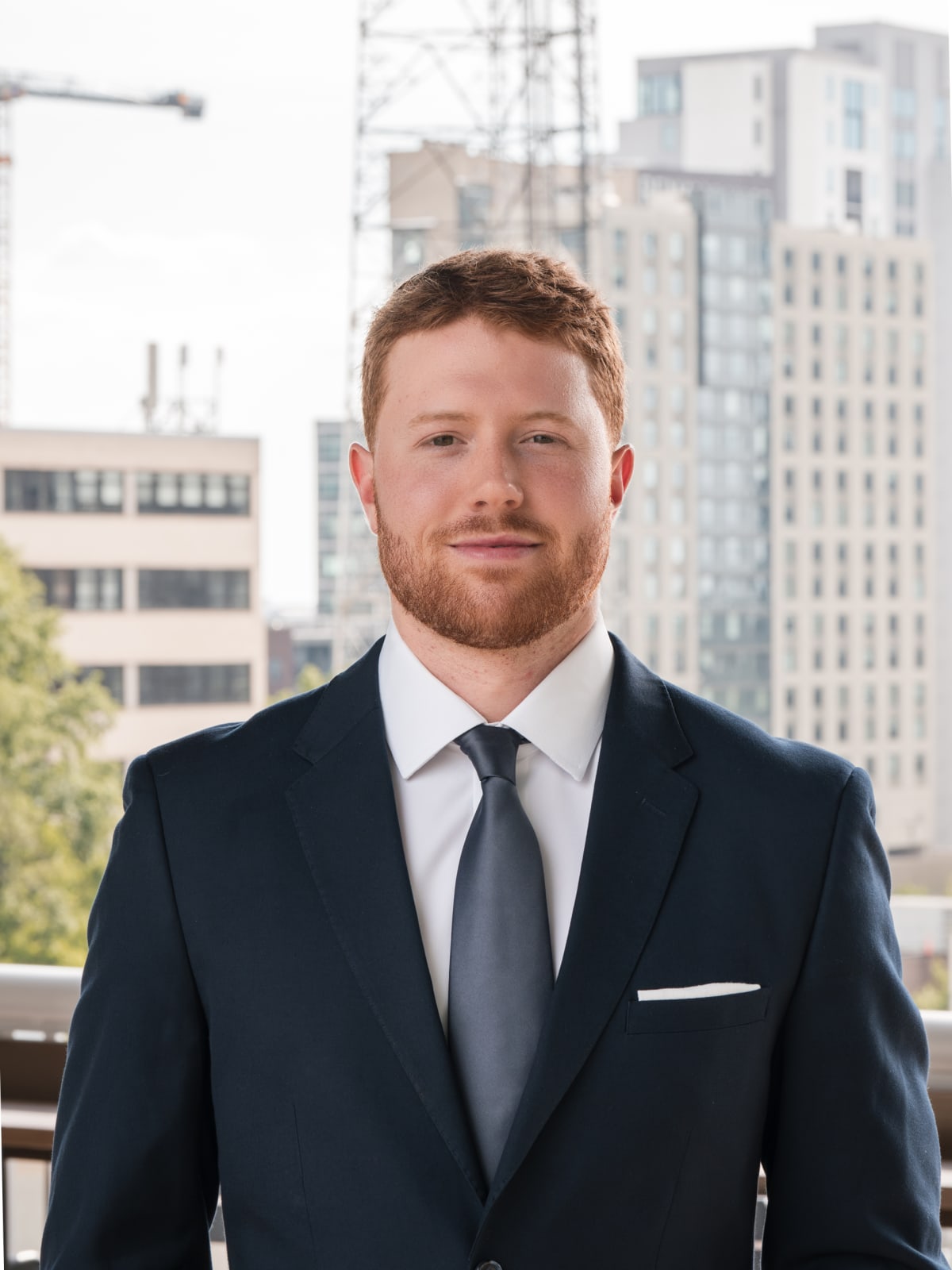 Corporate headshot against the Midtown Atlanta skyline