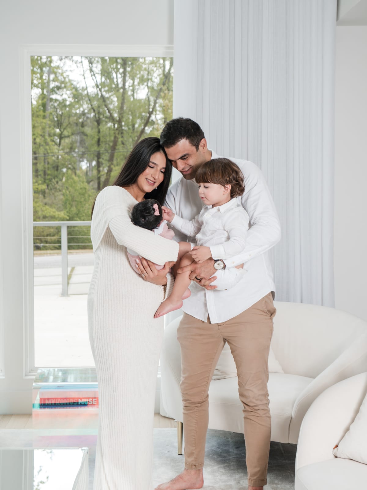 Newborn held close during a session