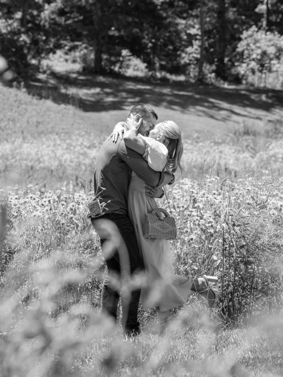Quiet kiss in the flowers, black and white