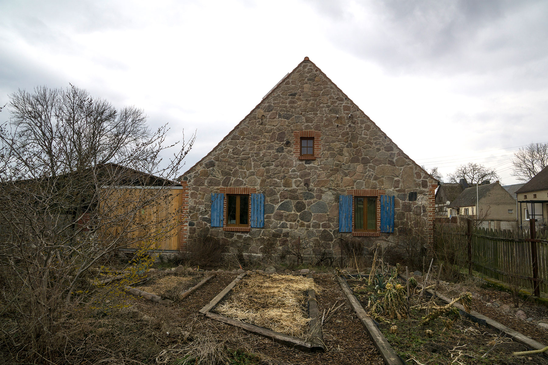 Feldsteinhaus Holzrahmenbau