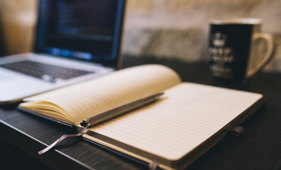 Coffee notebook writing computer