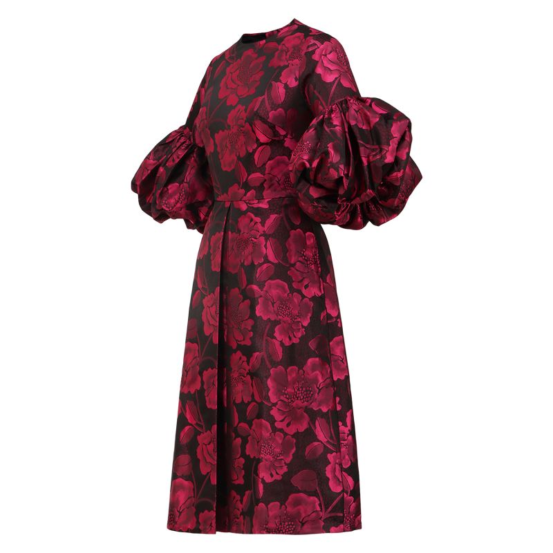 A Pleated Dress With Pink Floral Motifs And Voluminous Puff Sleeves